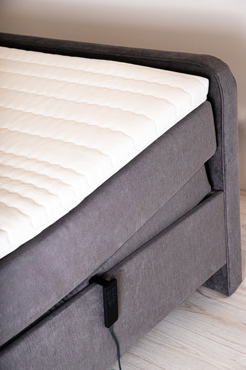 Blue single boxspring bed 140x210 cm