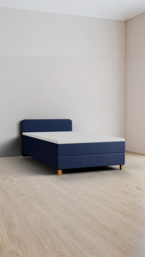 Blue single boxspring bed 90x220 cm