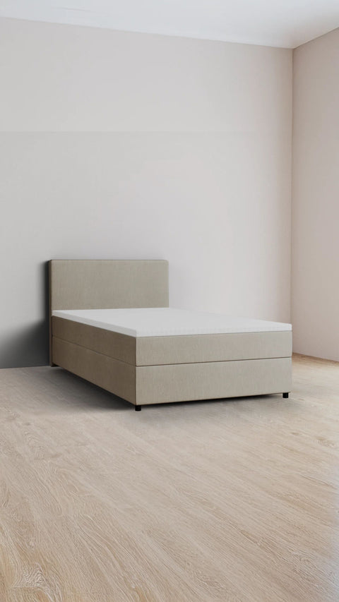 Beige single boxspring bed 140x200 cm