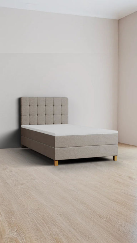 Beige single boxspring bed 90x210 cm