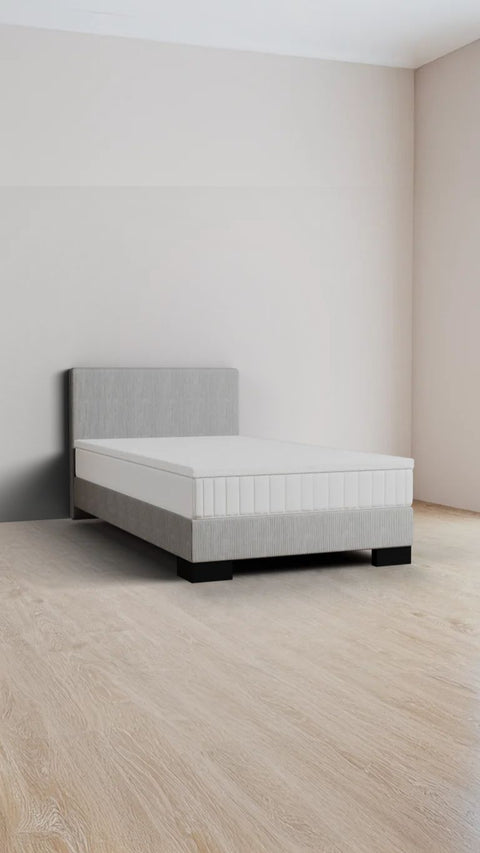 Grey single boxspring bed 90x220 cm