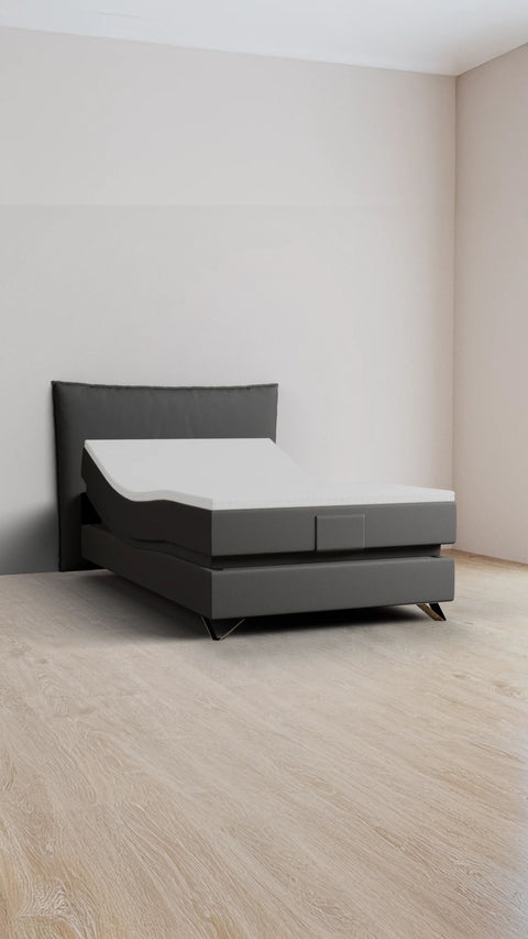 Grey single boxspring bed 140x210 cm
