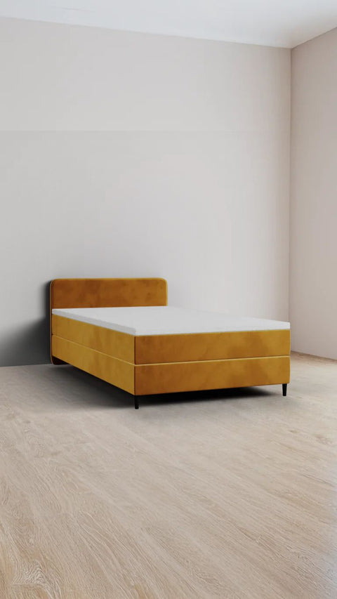 Yellow single boxspring bed 90x210 cm