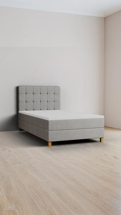 Grey single boxspring bed 90x210 cm