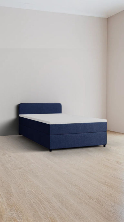 Blue single boxspring bed 90x210 cm