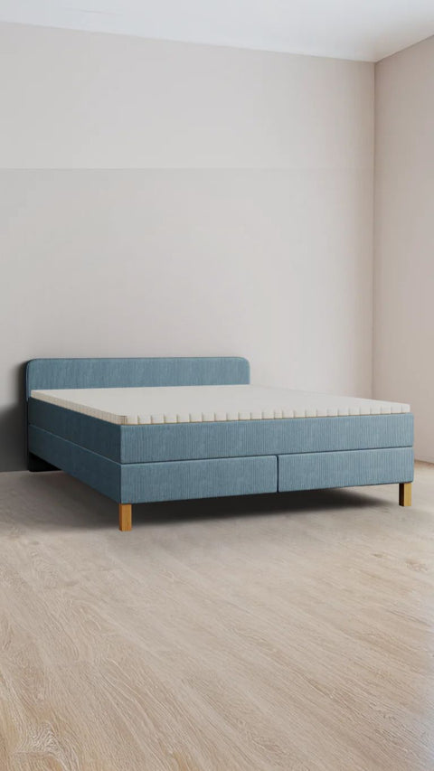 Blue double boxspring bed 180x210 cm